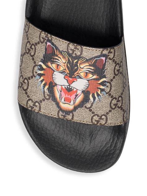 gucci pursuit angry cat slides|Gucci GG Supreme Slide 'Angry Cat' .